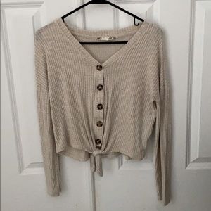 Women’s Long sleeve front tie buttoned shirt.